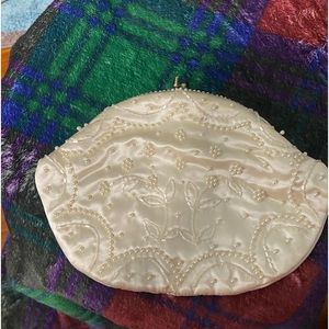 Beautiful ivory pearl clutch evening purse. Bought at antique store.